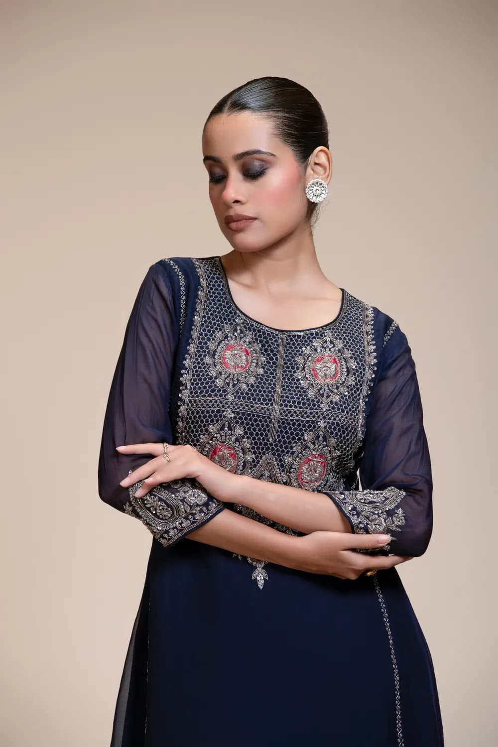 Close view of the hand embroidery on the Rudrayani Midnight Blue Kurta Sharara Set with Silver Embroidered Bodice